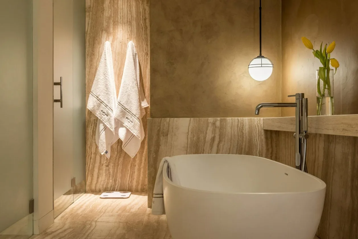 Euphoria Retreat towels hanging in bathroom